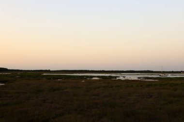 Cap-Ferret sahilinde gün batımı manzarası
