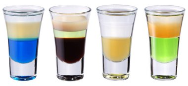 Four colorful layered shooters or small serving spirits. File contains clipping paths.