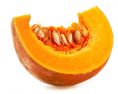 Ripe pumpkin slice with seeds isolated on white background.