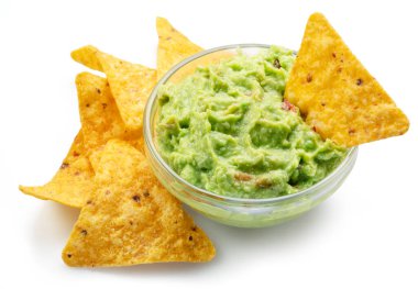 Guacamole sauce and tortilla chips, popular Mexican food  isolated on white background.  clipart