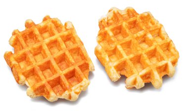 İzole edilmiş beyaz arkaplanı doldurmak için ekstra derin cepleri olan gerçek Belçika waffleları.