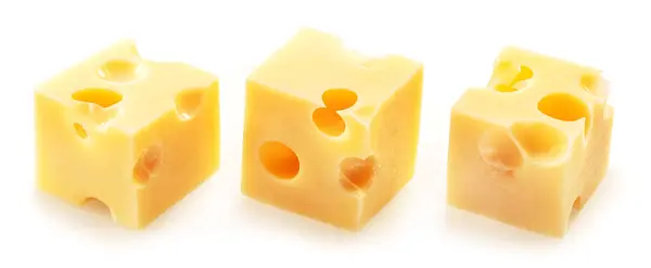 Three Emmental Maasdam Cheese Cubes Isolated White Background — Stock Photo, Image