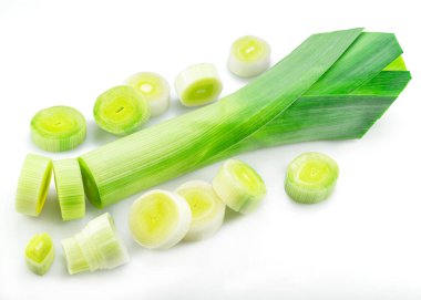 Rings of leek and leek with roots isolated on white background. clipart