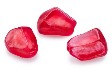 Beyaz arka planda nar tohumları. Dosya kırpma yolu içeriyor.