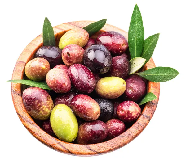 stock image Colorful semi-ripe and ripe olives in wooden bowl isolated on white background. Top view.