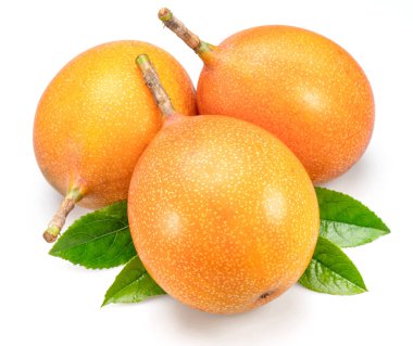 Granadilla fruits with leaves close up. The sweetest passiflora fruit or passionfruit. clipart