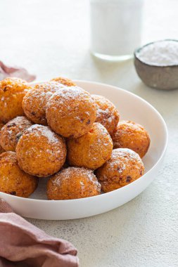 Doughnuts. Homemade cakes made from curd balls. Cottage cheese donuts  with powdered sugar. Selective focus