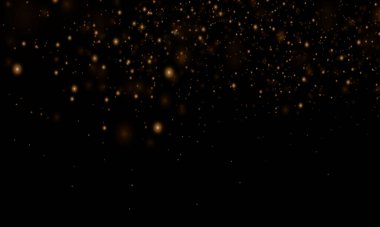 Altın kıvılcımlar ve altın yıldızlar özel ışık efekti.