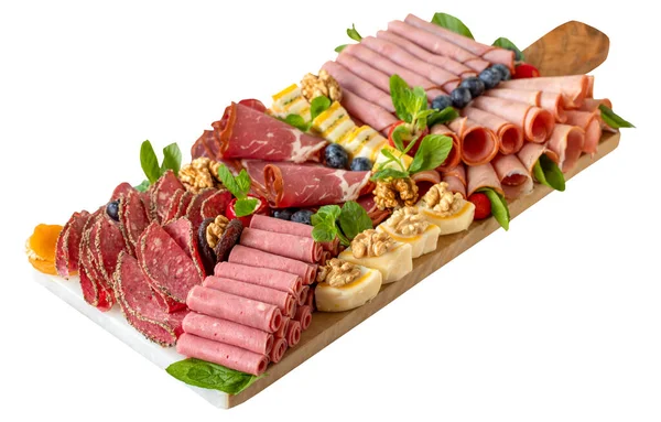 Cold Smoked Meat Plate isolated on white background. Antipasto set plater wooden plate. Cold smoked meat with prosciutto, salami, bacon, veal cutlet