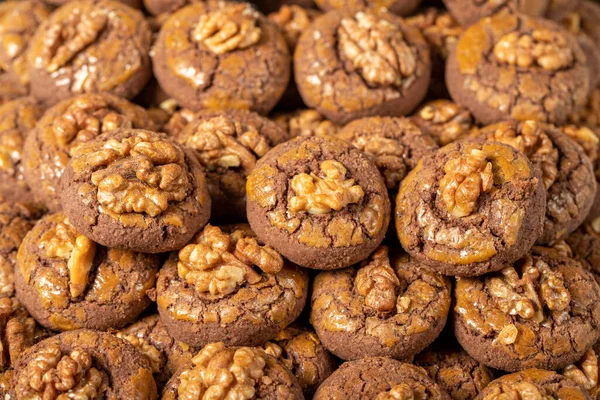 Cocoa and walnut cookies. Fresh walnut cookies. Bakery products. close up