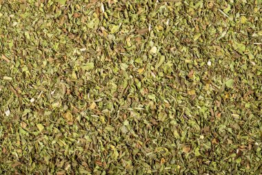 Dried mint, cut into pieces as a background with many details. Food background. Dry spice concept. Top view