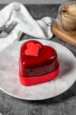 Heart cake. Valentine's day cake on a dark background. Custom made cake for Valentine's Day. close up