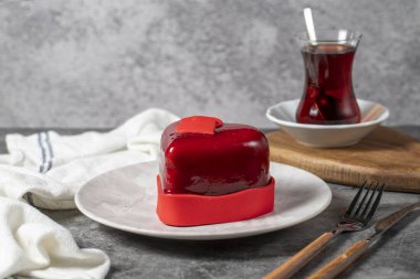 Heart cake. Valentine's day cake on a dark background. Custom made cake for Valentine's Day. close up