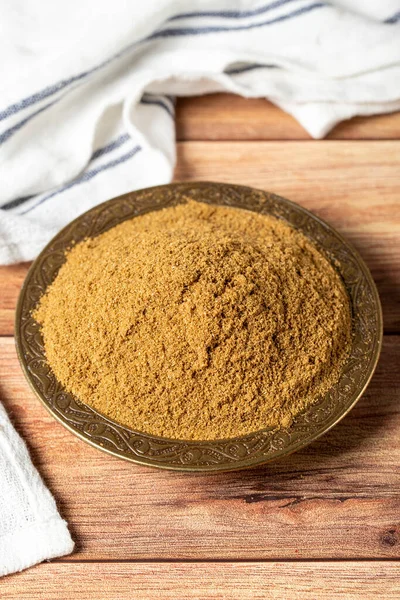 stock image Powdered cumin spice. Cumin spice in bowl on wooden background. Dry spice concept. close up