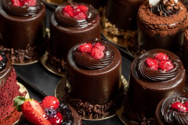 Types of cakes. Delicious cakes in bulk at the patisserie counter. close up