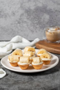 Banana tartlet. Delicious tartlet dessert on plate. close up
