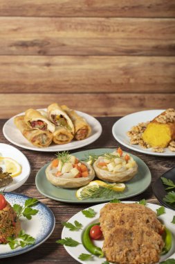 Ramadan table. Turkish food on wooden background. Iftar and sahur delicacies. Turkish oriental dishes. Types of appetizers. close up