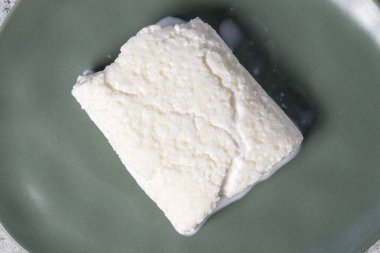 Clotted cream or butter cream. Turkish creamy dairy product. Cow's cream for breakfast. Local name kaymak. Top view