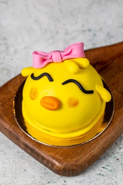 Special design bird shaped cake. Design cake for kids on gray background