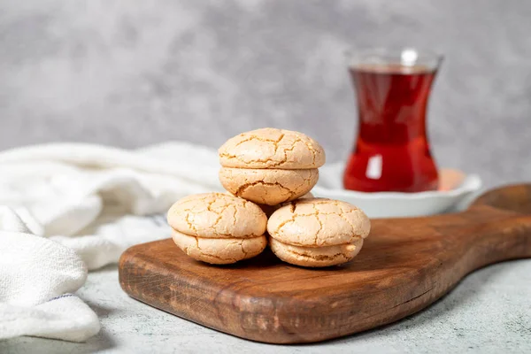 Almond cookies. Cookies made with almond flour on a stone background. Local name acibadem kurabiye. Patisserie sweets