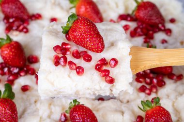 Gullac dessert. Traditional Ramadan dessert. Close-up of gullac dessert with pomegranate and strawberry clipart