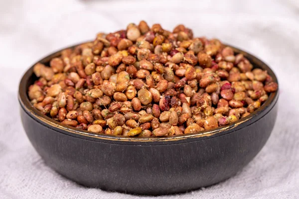 stock image Sumac seeds. Dried sumac berries on white background. Spice concept. Close up