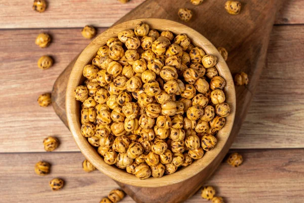 stock image Roasted chickpea. Roasted chickpeas in wooden bowl. superfood Vegetarian food concept. healthy snacks. Top view