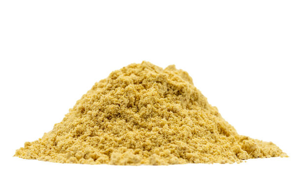 Ginger powder isolated on white background. Pile of ginger powder