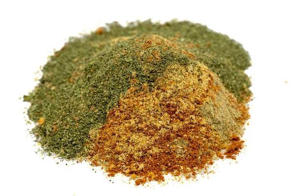 Mixed spice. Spices prepared with a mixture of mint, fenugreek flour, ground pepper, poyotu, thyme, sumac, coriander powder, paprika isolated on white background. Pile of Mixed Spices. Close up