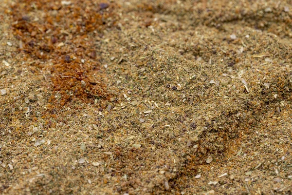 Pile of Mixed spice powder as background, spice or seasoning as background. Close-up mixed spice