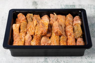Lahana sarması. Sağlıklı mezeler. Yemek geçmişi. Yerel adı lahana sarmasi