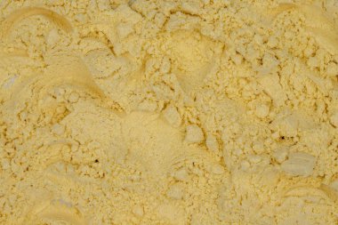 Arka plan olarak mısır unu, baharat ya da baharat yığını. Yakın plan mısır unu.