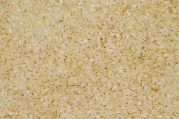 Stos Surowego Ryżu Jako Tło Rośliny Strączkowe Jako Tło Zbliżenie — Zdjęcie stockowe