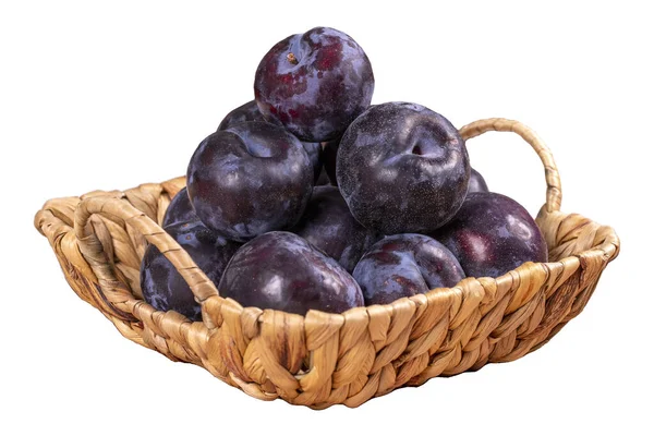 stock image Black plum isolated on white background. A pile of black plums in a basket. close up