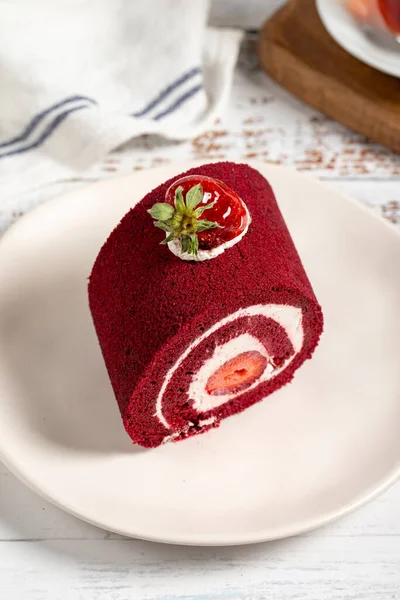 Strawberry and cream roll cake. Delicious cake with whipped cream and strawberries
