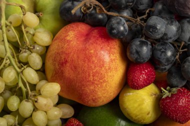 Karışık meyve. Taze renkli meyve arkaplanı yakın plan. Üst görünüm