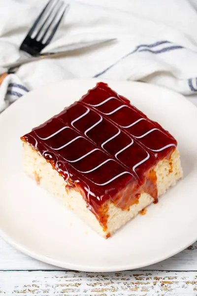 Tres leches cake. Slices of trilece cake with milk and caramel on a wooden background. patisserie products. Close up
