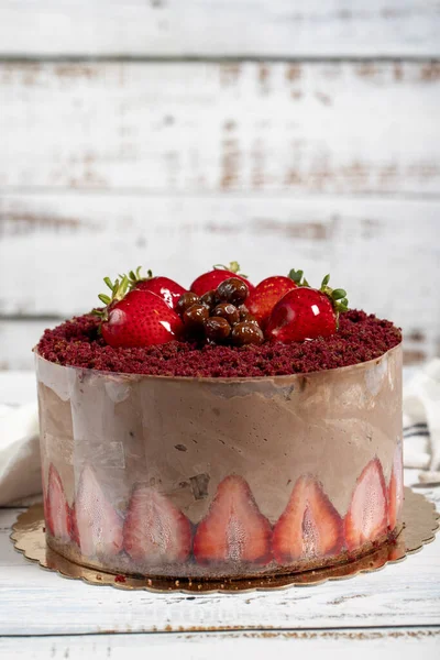 Birthday cake. Strawberry and cream cake on a white background
