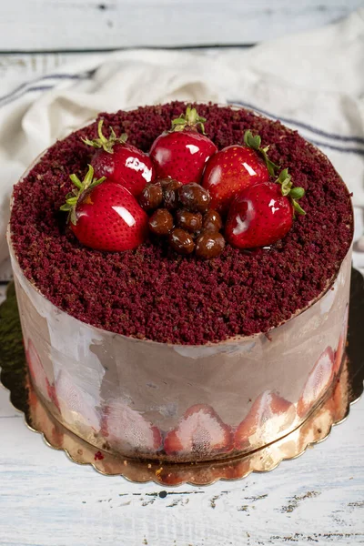 Birthday cake. Strawberry and cream cake on a white background. Close up