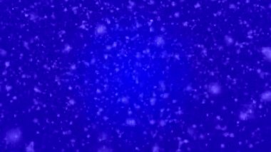 Many white snowflakes falling down on a dark blue background
