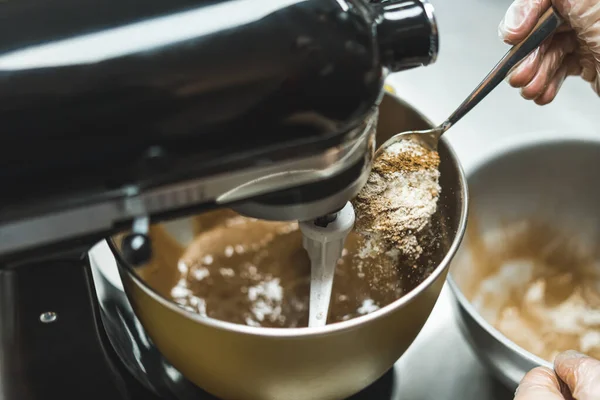 Unrecognisable Baker Pouring Ingredients Golden Bowl Stand Mixer Prepare Chocolate — Fotografia de Stock