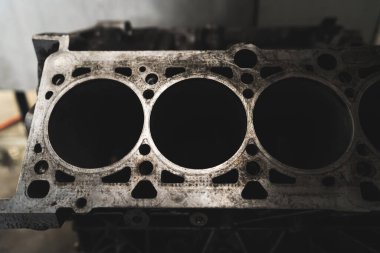 A close-up of a car engine block with its intricate details car service station. High-quality photo