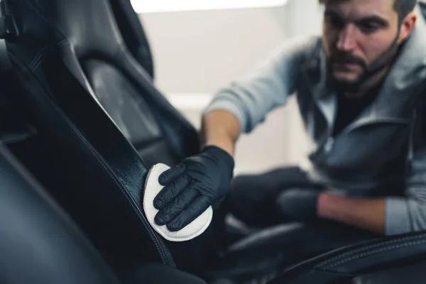 Caucasian Man Wearing Black Gloves Leaning Car Waterproofing Leather Car — Stockfoto