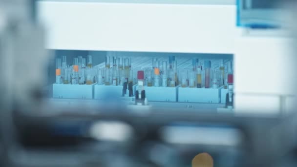 Long Shot Test Tubes Moving Glass Automated Lab Background Blurred — Stockvideo
