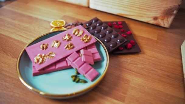 Decorative Pink Dark Chocolate Bars Nuts Fruits Craft Premium Chocolate — Vídeo de Stock