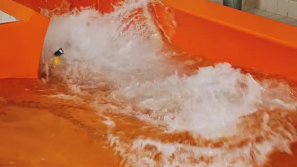 Elderly Man Plunging Pool Camera Orange Tunnel Slide High Quality — Vídeos de Stock