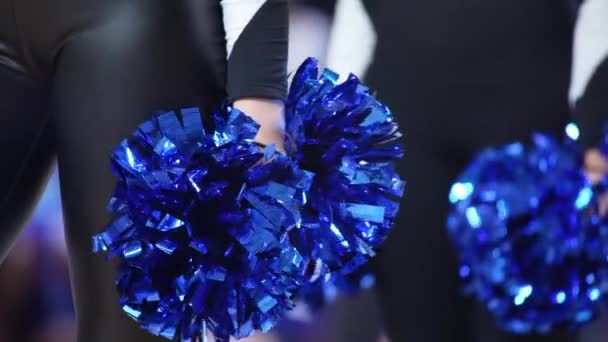Closeup Shot Cheerleaders Black Uniforms Holding Blue Pom Poms Sport — Vídeo de Stock