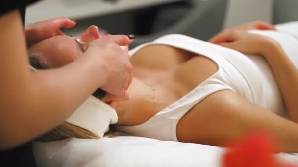 Woman Getting Relaxing Facial Massage Aesthetics Clinic Beauty Treatment High — Stock Video