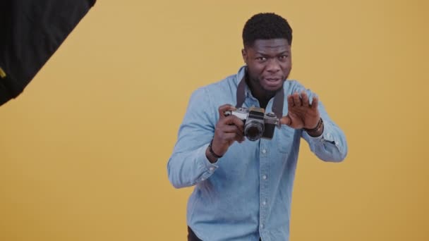 Photographer Taking Picture Using Camera Hanging His Neck While Giving — Stockvideo