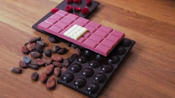 Decorative Dark Pink White Chocolate Bars Presented Wooden Table Docorated — 图库视频影像